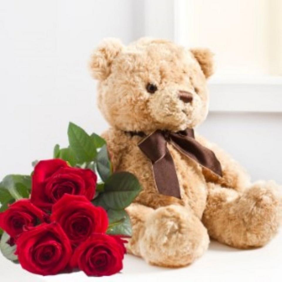Image 1 of 1 of SEVEN RED ROZES AND TEDDY BEAR
