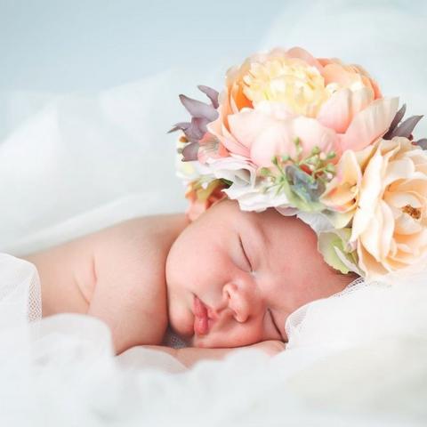 Baby-girl-with-flower-headdress