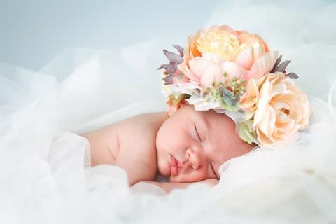 Baby-girl-with-flower-headdress