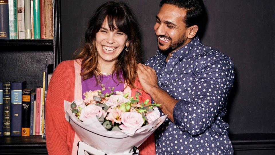 Couple with large bouquet