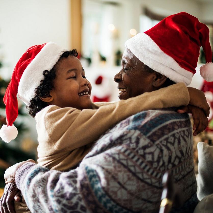 Father_and_daughter_wearing_santa_hats