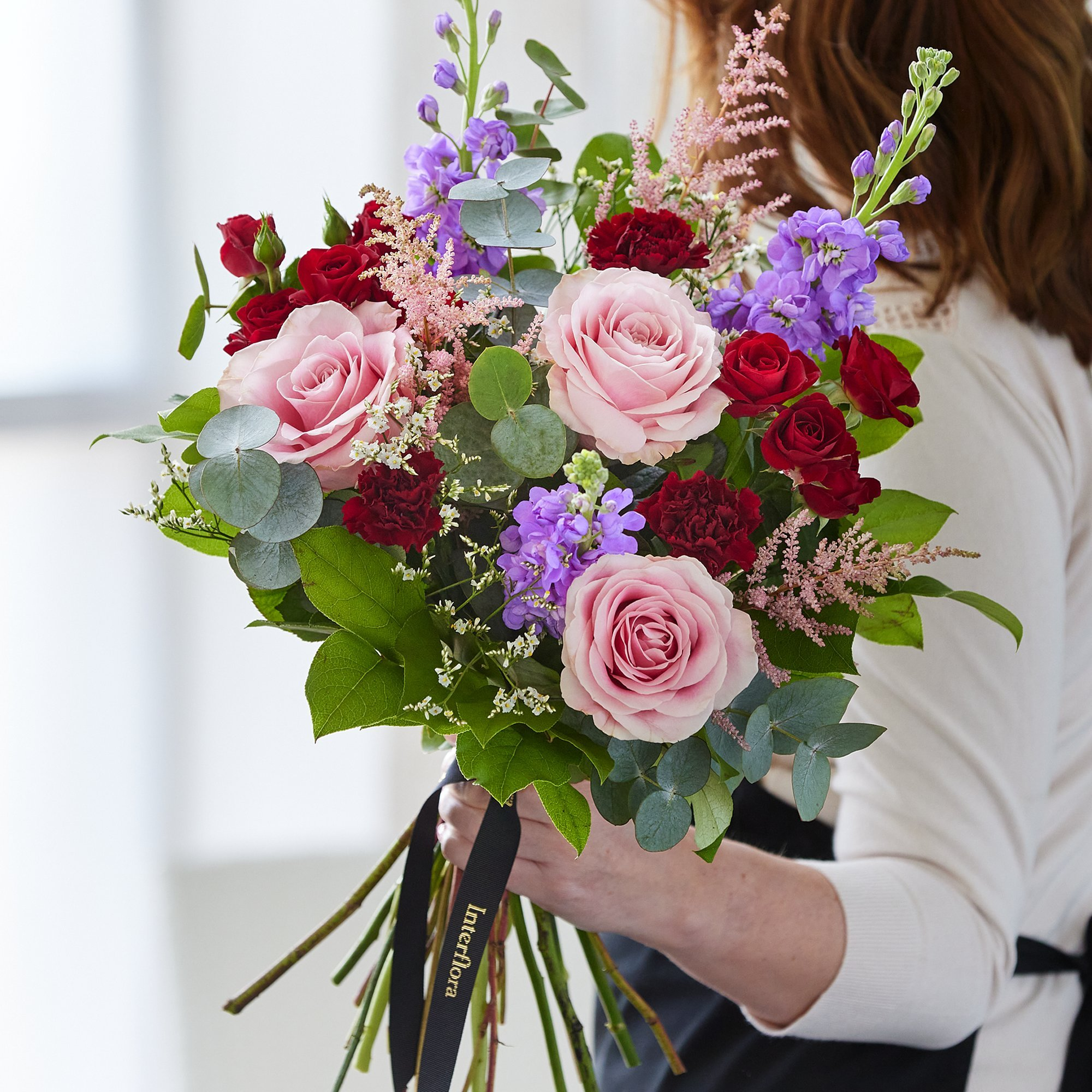 Hand-tied bouquet made with the finest flowers - Interflora | Interflora