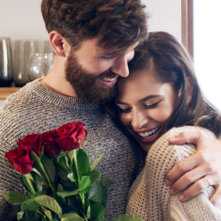 Mand_and_woman_hugging_with_roses-content-feature-CROP