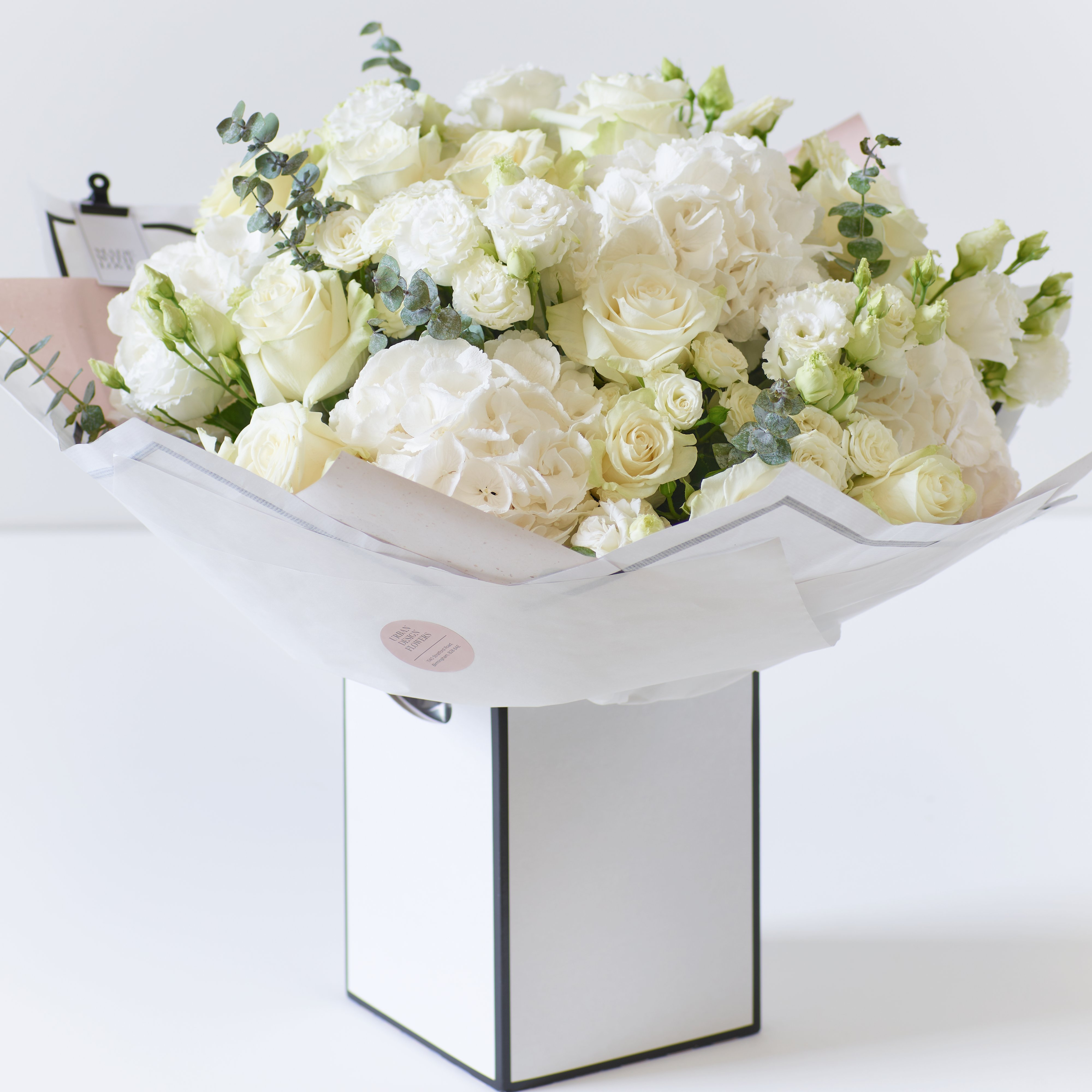 Click to view product details and reviews for Beautifully Simple Showstopper White Flower Bouquet.