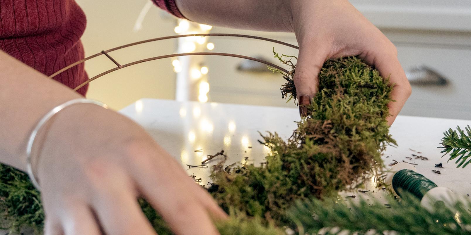 adding_moss_to_wire_wreath
