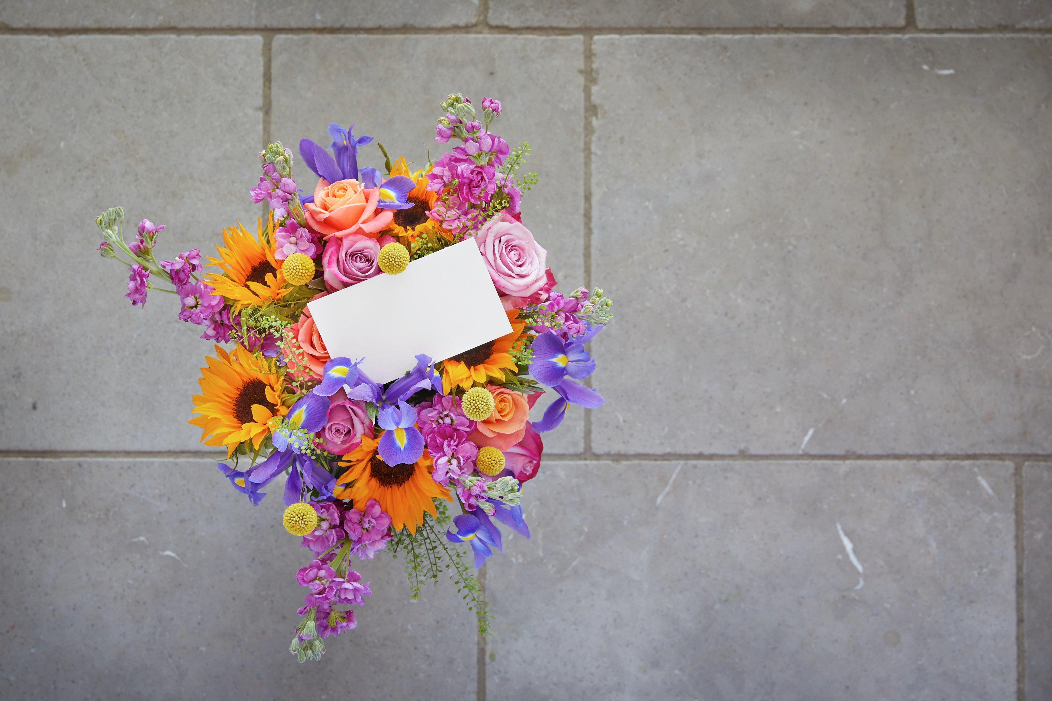 bright-bouquet-flowers-vase-on-path