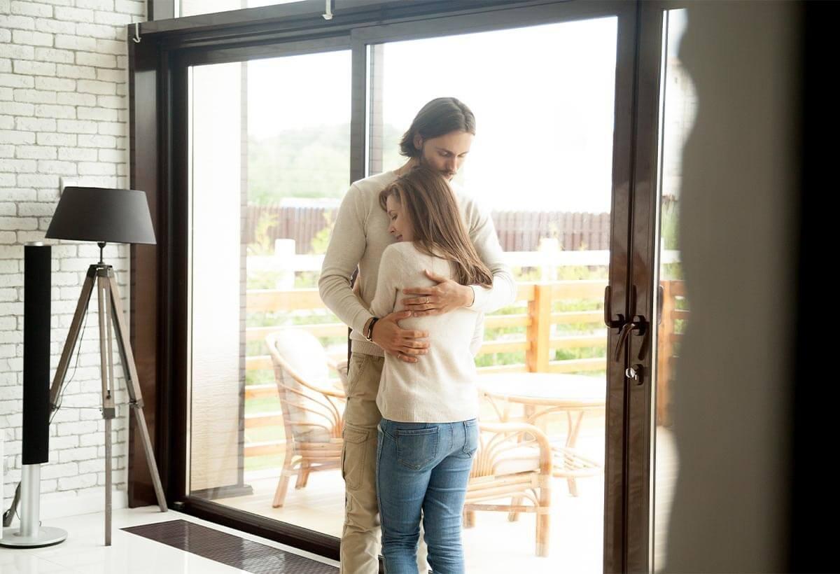 couple-embracing-one-another