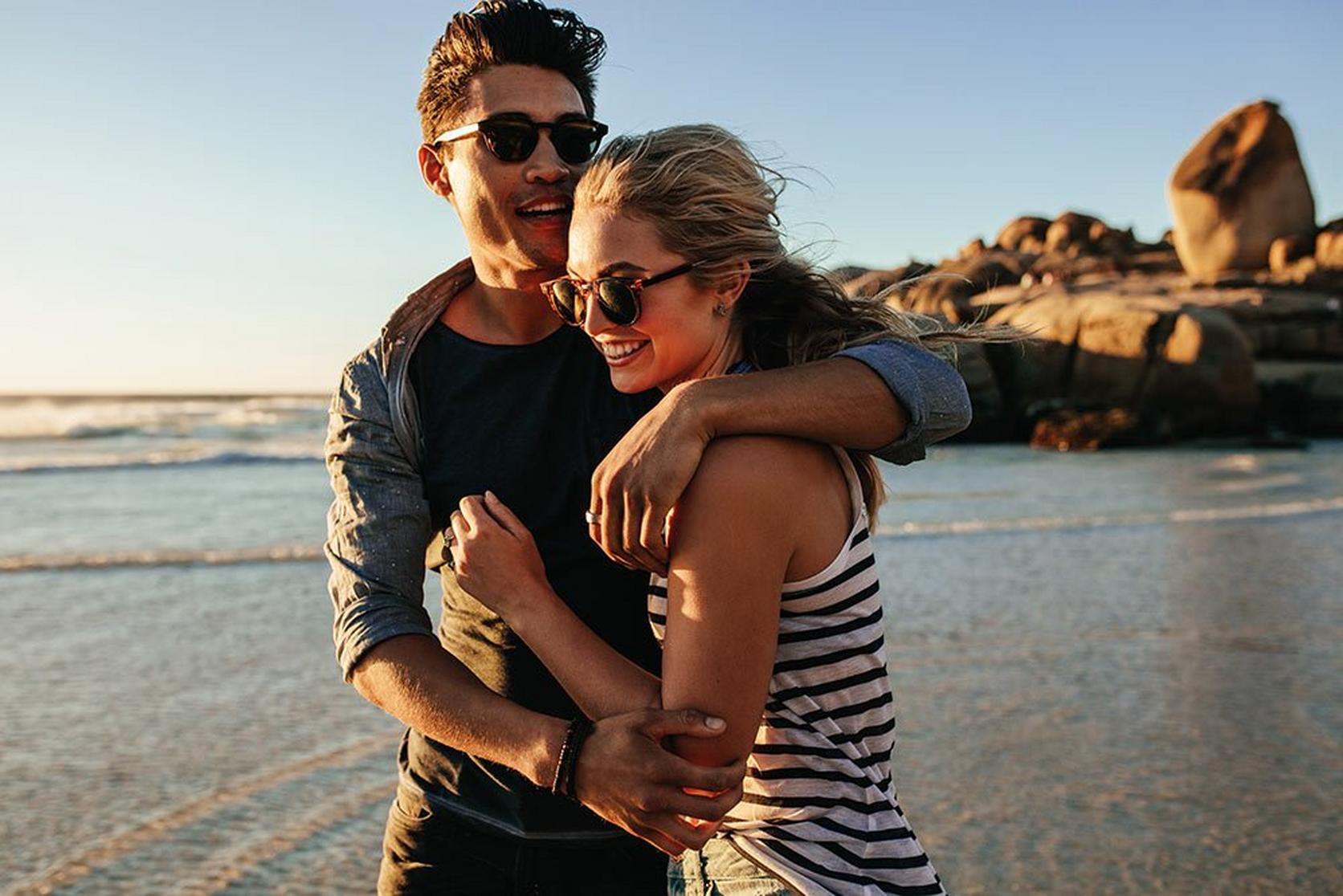couple-hugging-on-beach