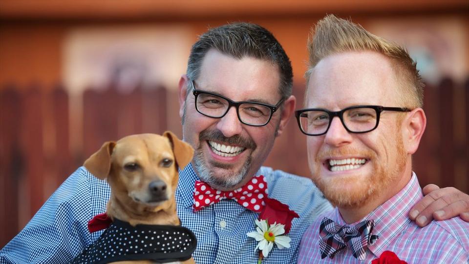 couple-smiling-with-dog