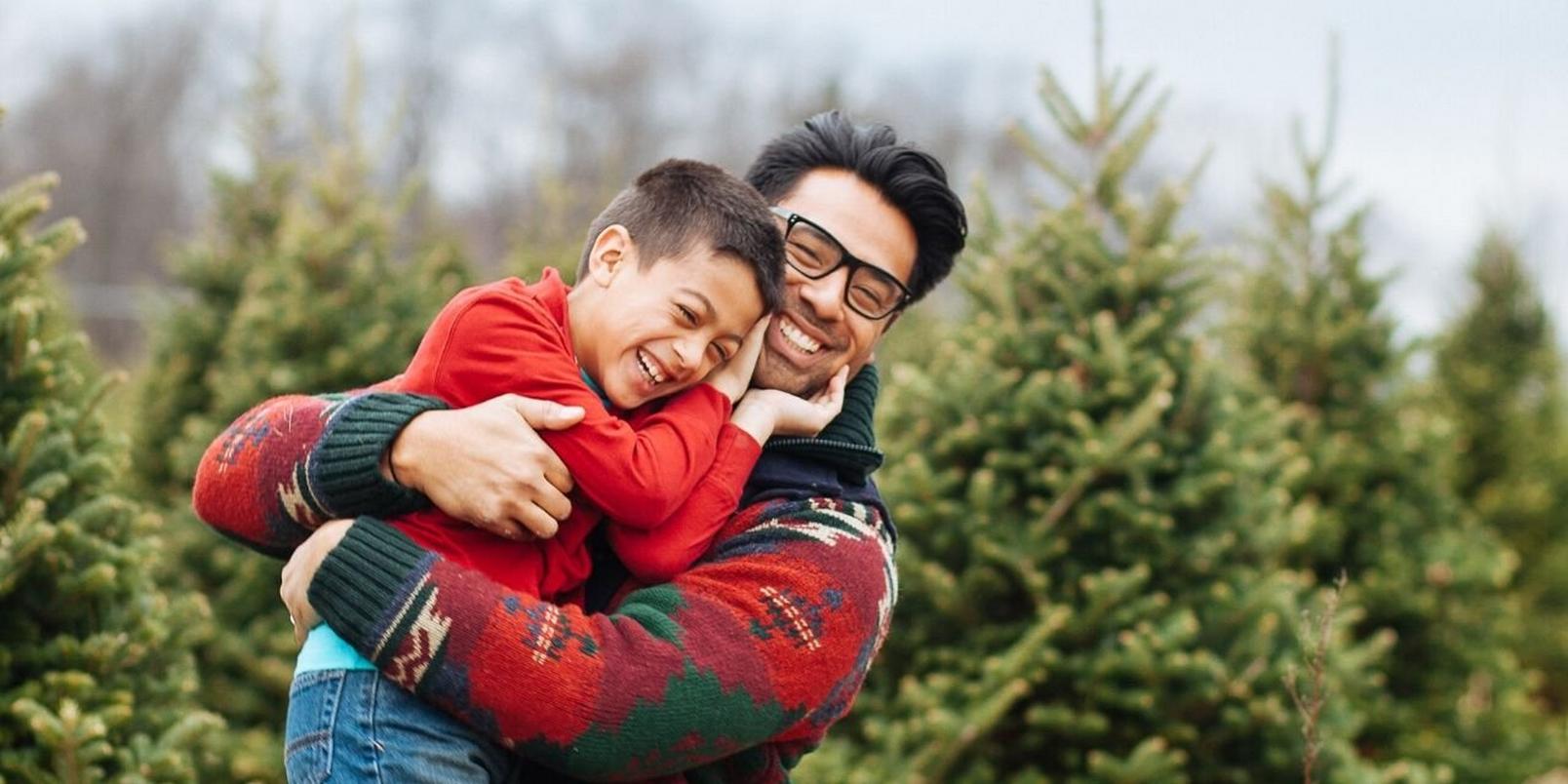 father-and-son-hugging-smiling