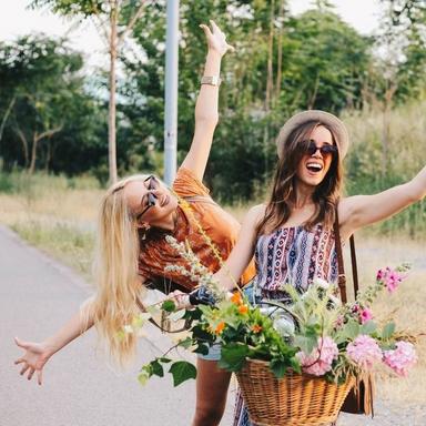 friends-taking-selfie-on-bike-flower-basket
