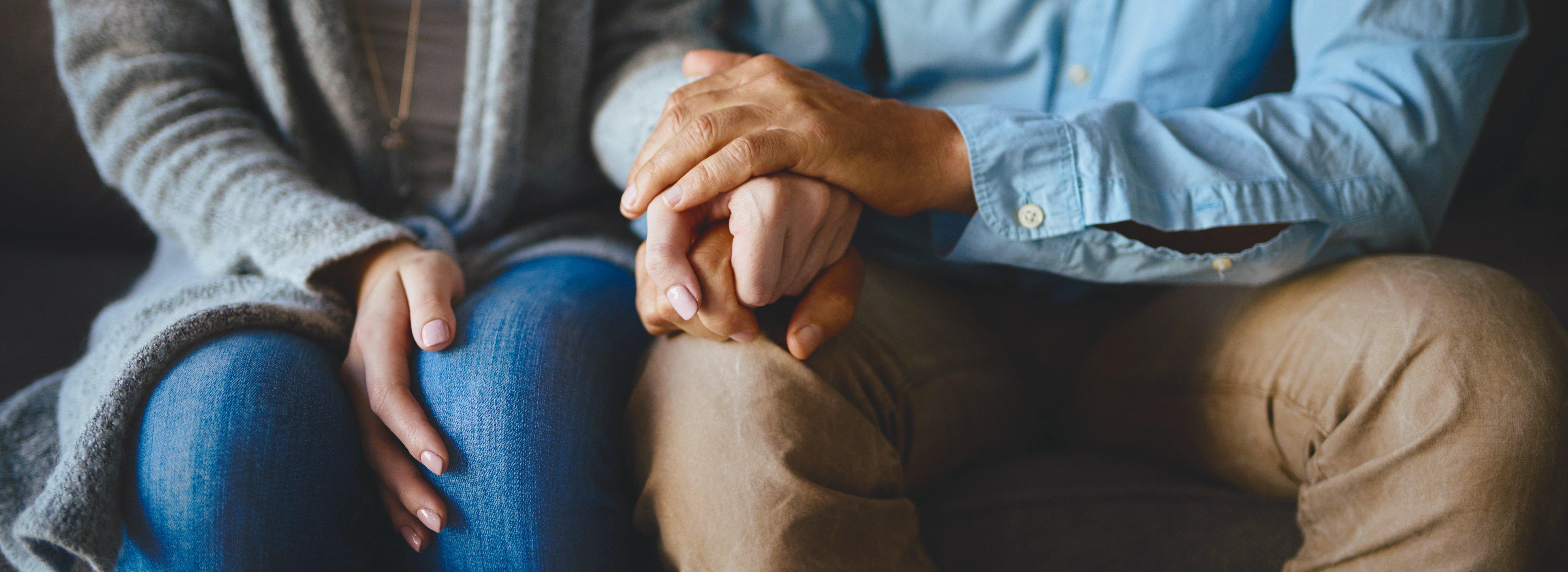 hand-holding-sympathetic-embrace