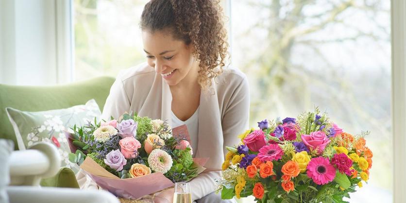 happy-recipient-with-bouquet-of-flowers