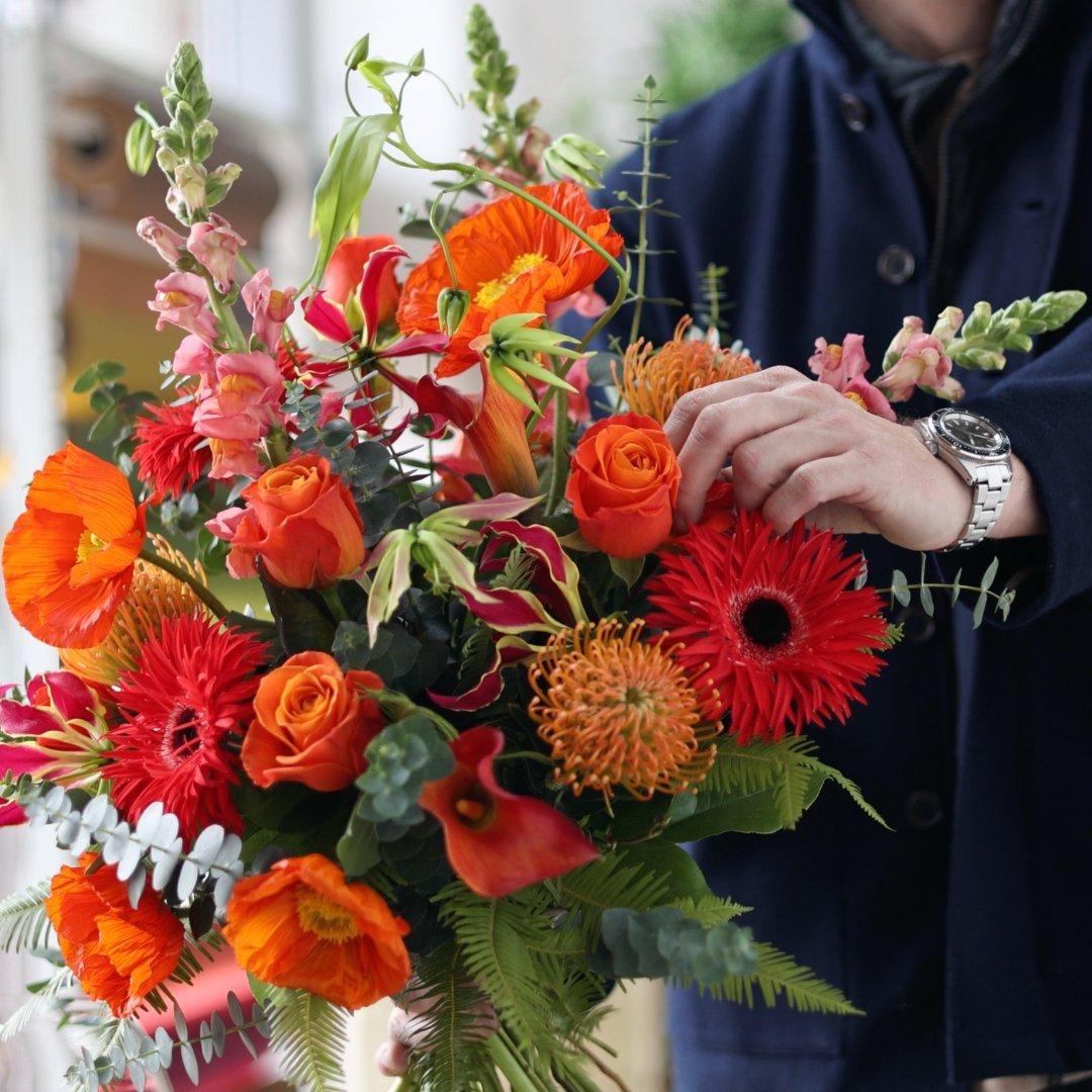 male_florist_making_bouquet