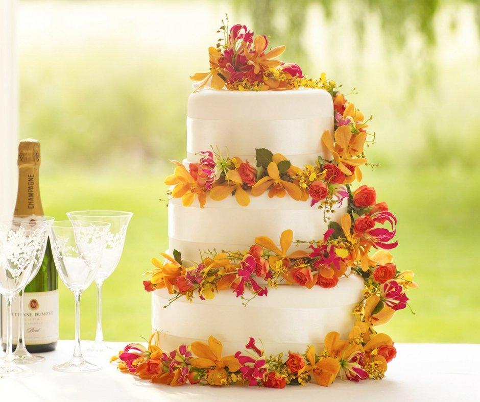 white-wedding-cake-tropical-floral-decorations